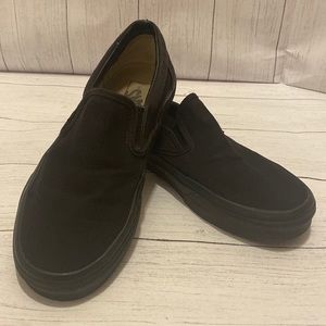 Solid black vans
